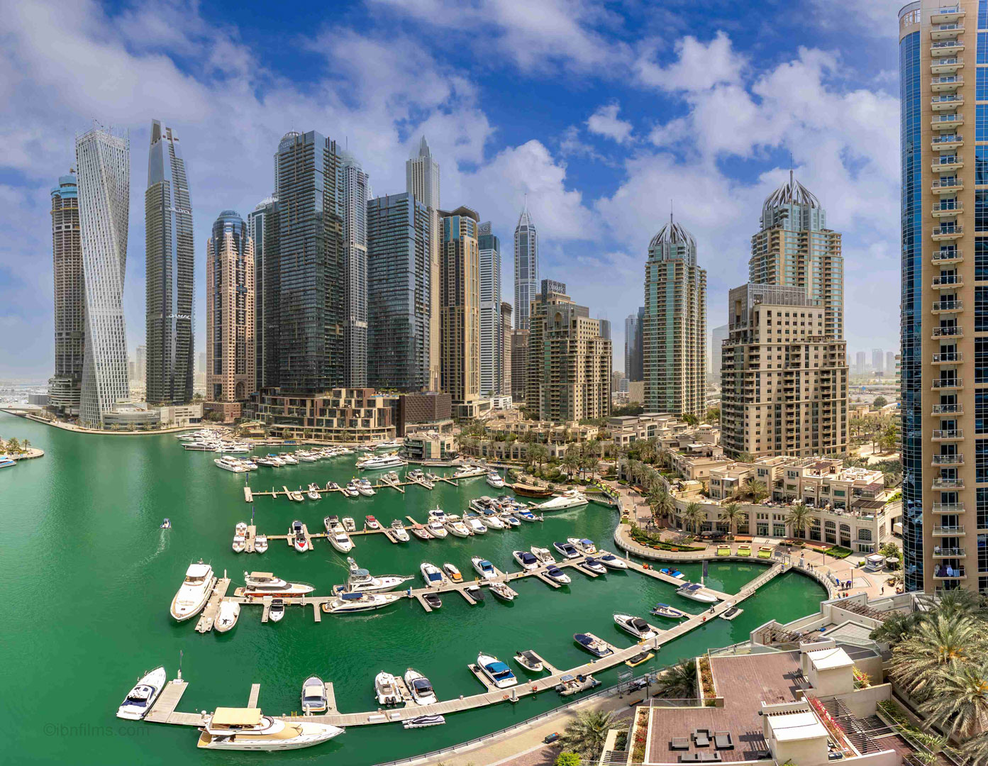 Modern Dubai high-rise buildings with a sea view, captured by IBN Films.