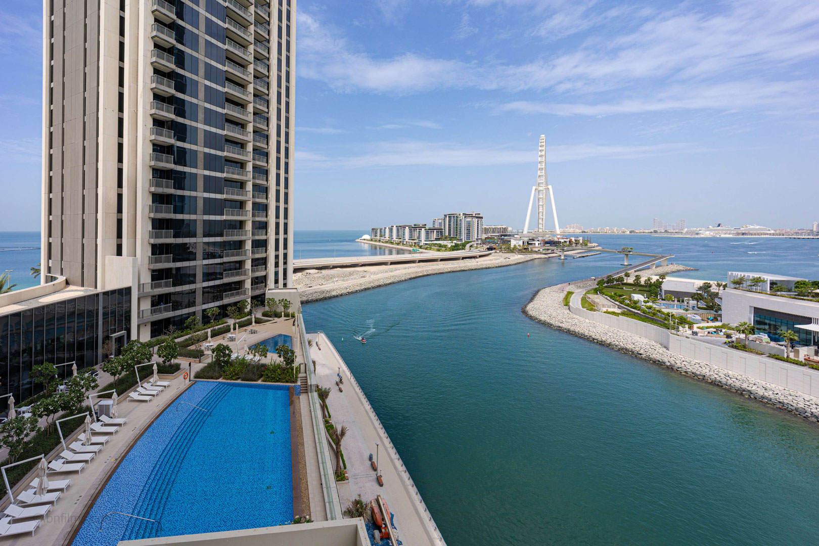 Modern Dubai high-rises with a city skyline view, photographed by IBN Films.