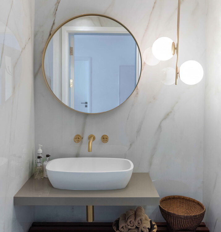 Modern bathroom interior with basin and mirror in a Dubai residence, architectural interior photography by IBN Films