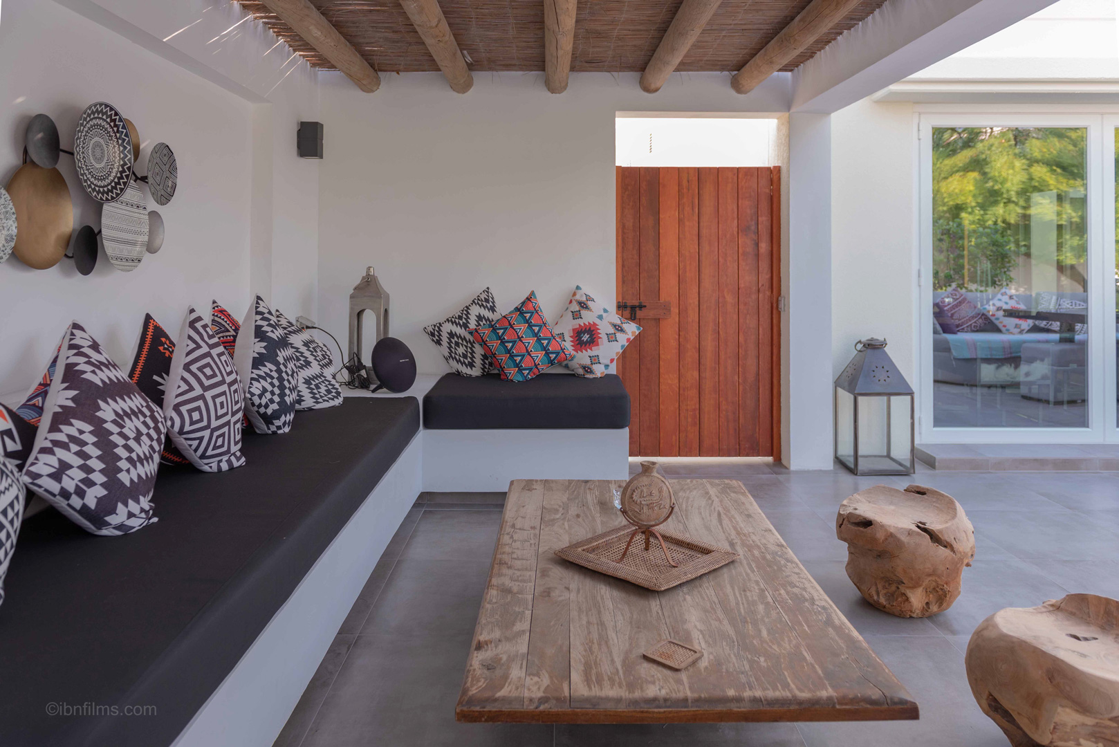 Modern sitting area with decorative cushions, contemporary interior photography by IBN Films