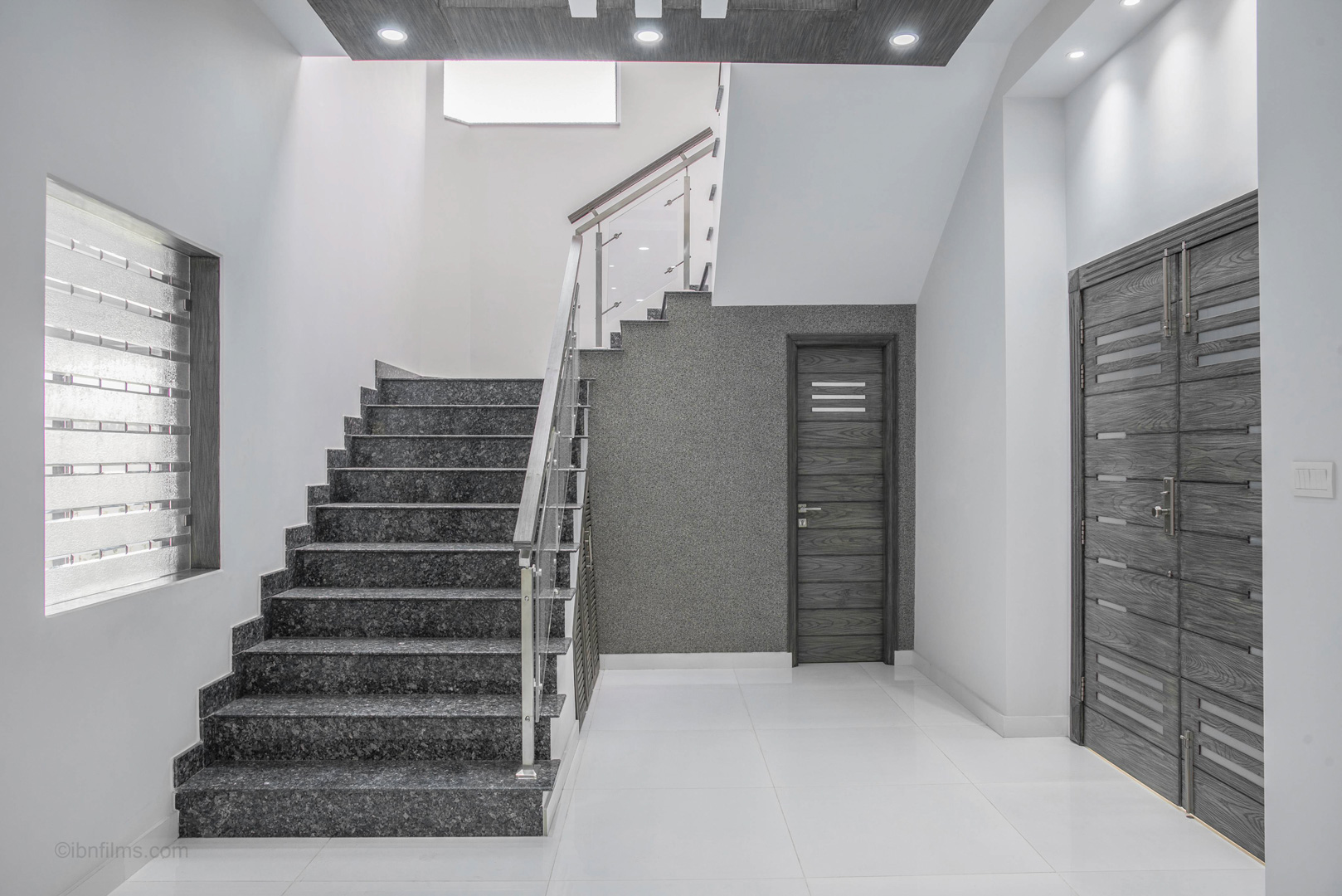 Modern interior staircase design in Dubai, photographed by IBN Films.