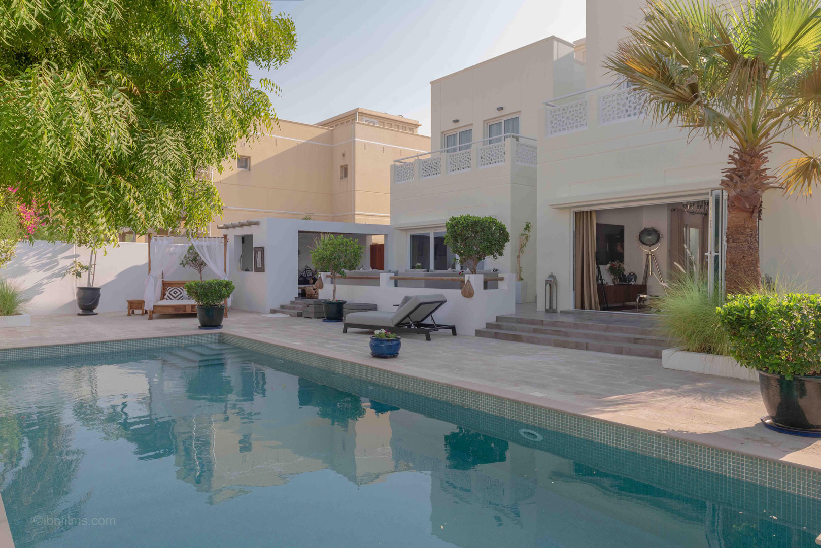 Architecture outdoor photography of a modern swimming pool with clean design in Dubai