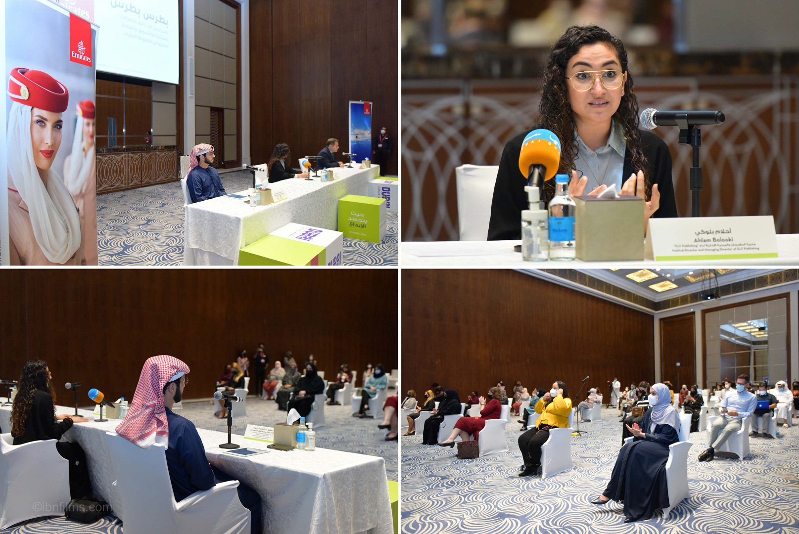 Corporate event photography showing executive interaction during a professional business event in Dubai.