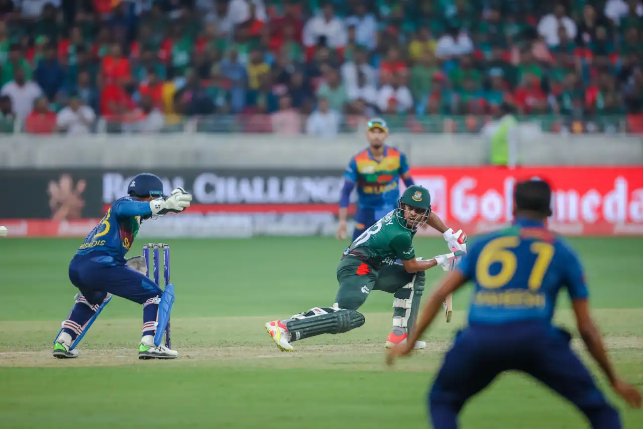 Cricket players captured in dynamic action during a match in Dubai, UAE, photographed by IBN Films