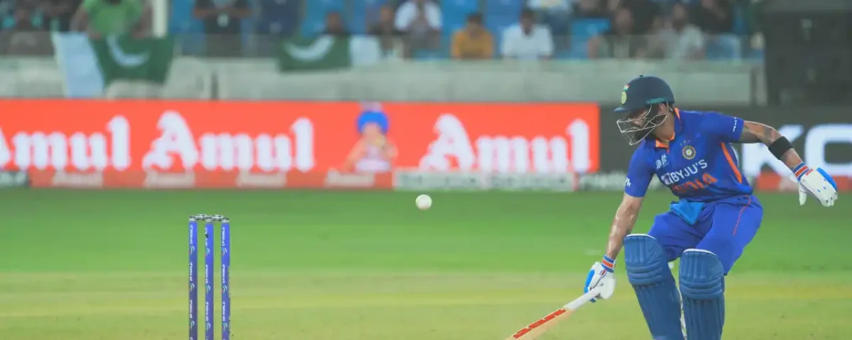 Cricket batsman executing a shot during a match in Dubai, UAE, photographed by IBN Films