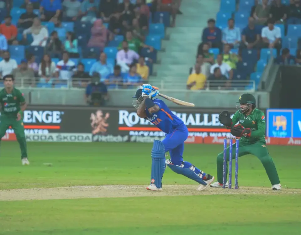 Cricket batsman captured in action during a match in Dubai, UAE, photographed by IBN Films