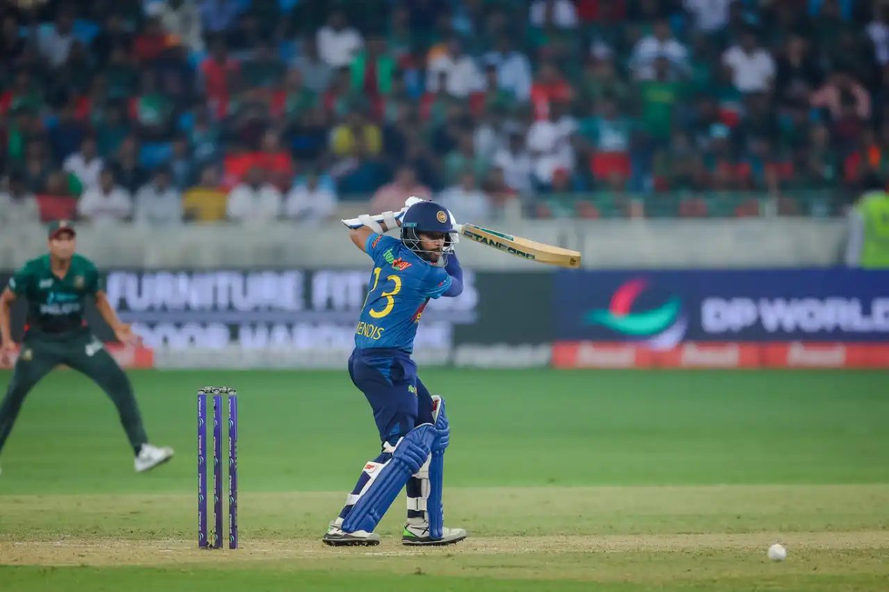 Cricket bowler captured mid-action during a match in Dubai, UAE, photographed by IBN Films