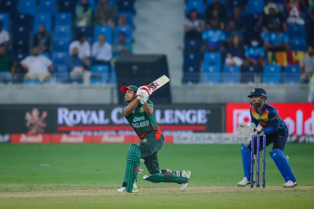 Cricket fielder captured in action during a live match in Dubai, UAE, photographed by IBN Films