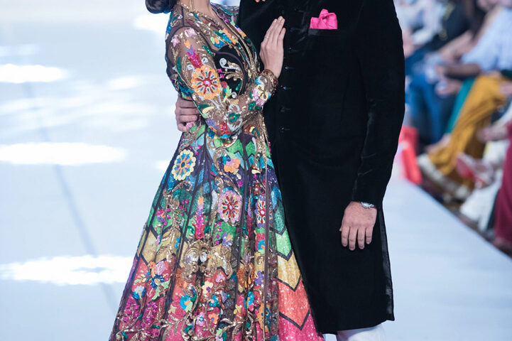 Designer lehenga fashion runway in Dubai featuring famous Pakistani superstars Mehwish Hayat and Humayun Saeed