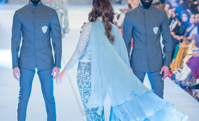 Fashion couple runway photography in Dubai featuring male and female models presenting designs by HSY