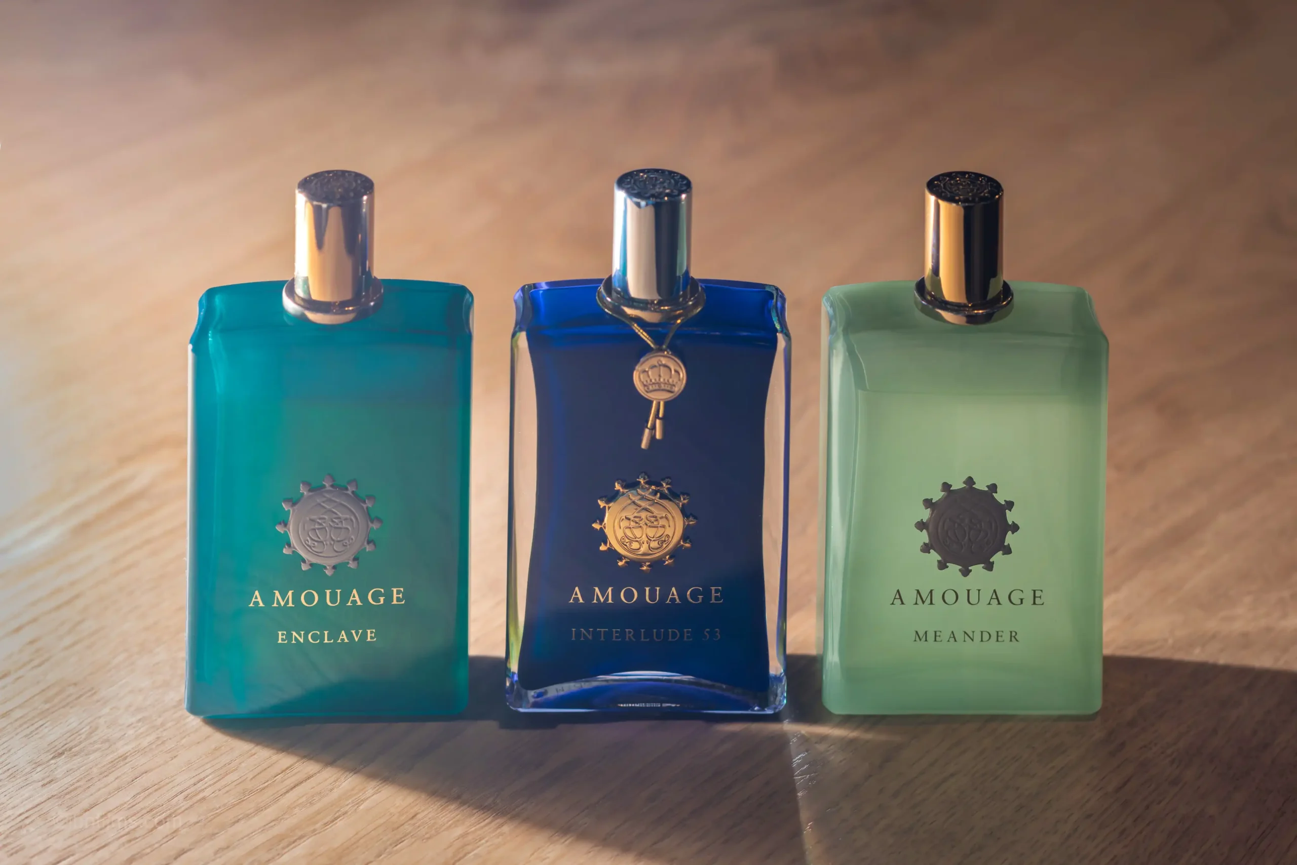 Luxury blue perfume bottles professional product photography by IBNFilms