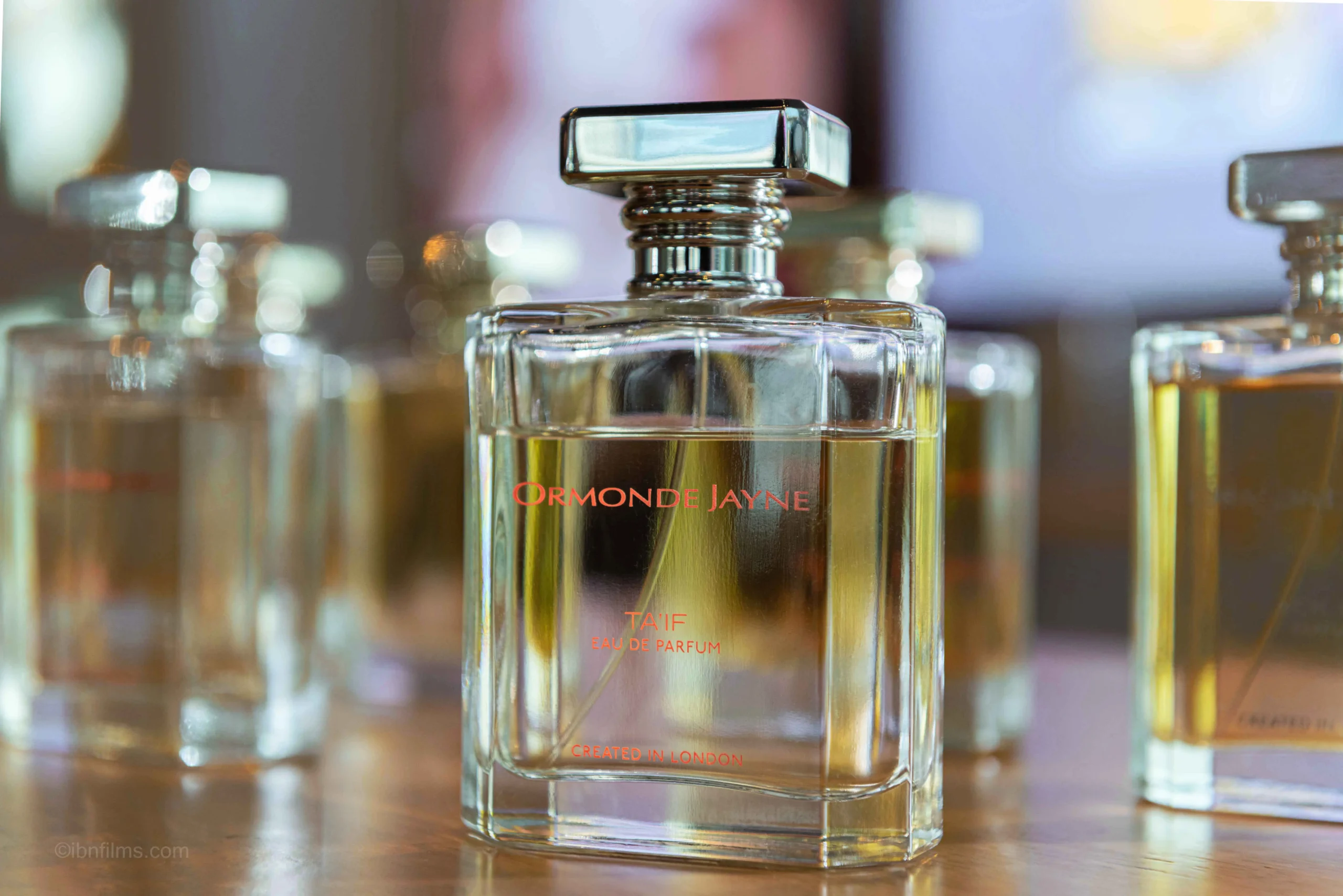 Luxury gold perfume bottle professional lighting photography by IBNFilms