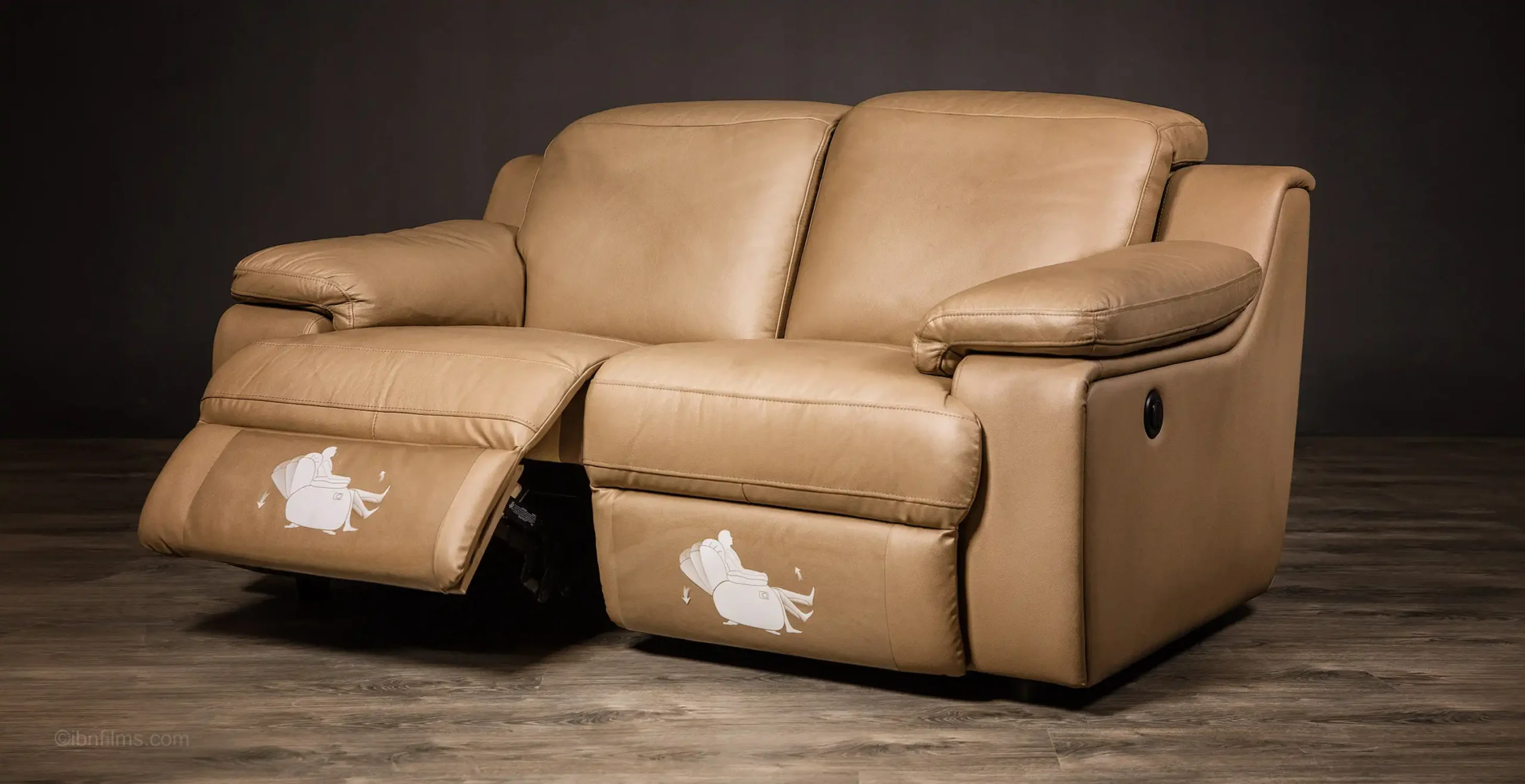 A premium tan leather sofa styled in a high-end, modern living room interior, professionally photographed by IBN FILMS.