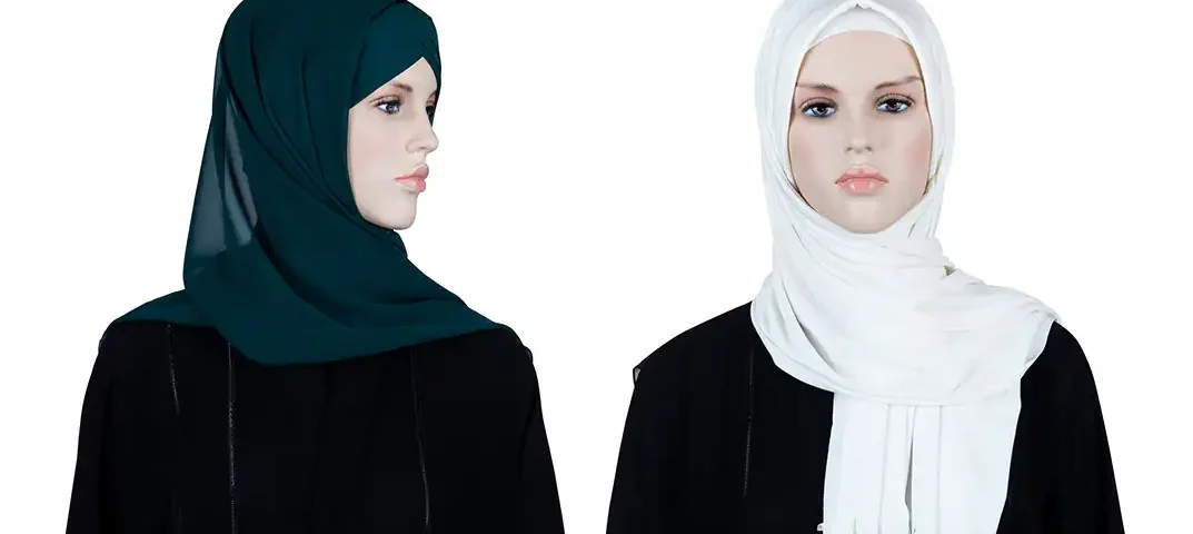 A female model showcasing elegant modest fashion with a beautifully styled hijab during a lifestyle shoot in the UAE by IBN FILMS.