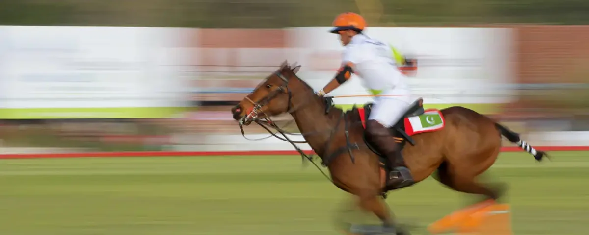 Polo sports action photography showing riders in motion during a match in Dubai, UAE captured by IBN Films