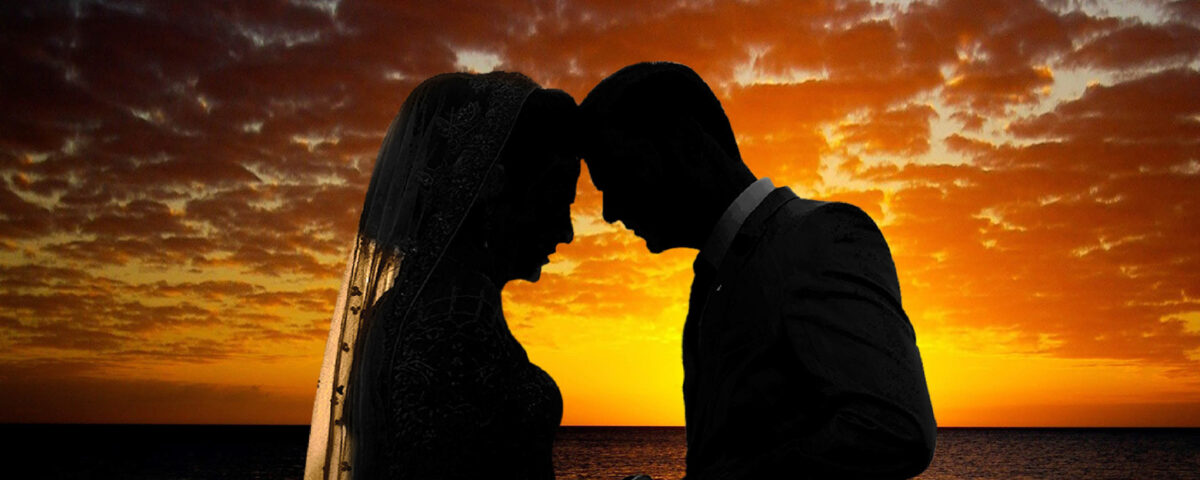 Sunset wedding couple in Dubai captured in a romantic golden-hour moment, photographed by IBN Films.