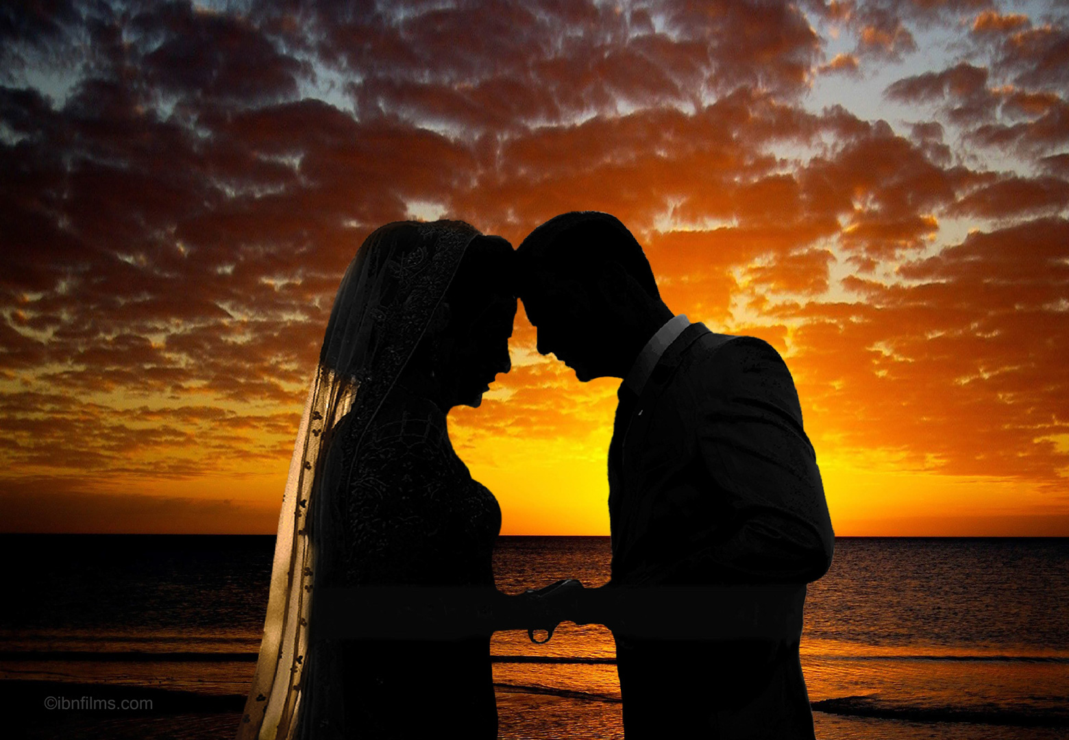 Sunset wedding couple in Dubai captured in a romantic golden-hour moment, photographed by IBN Films.