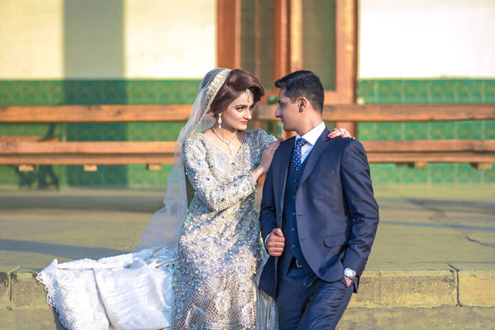 Sunset wedding couple in Dubai captured in a romantic golden-hour moment, photographed by IBN Films.