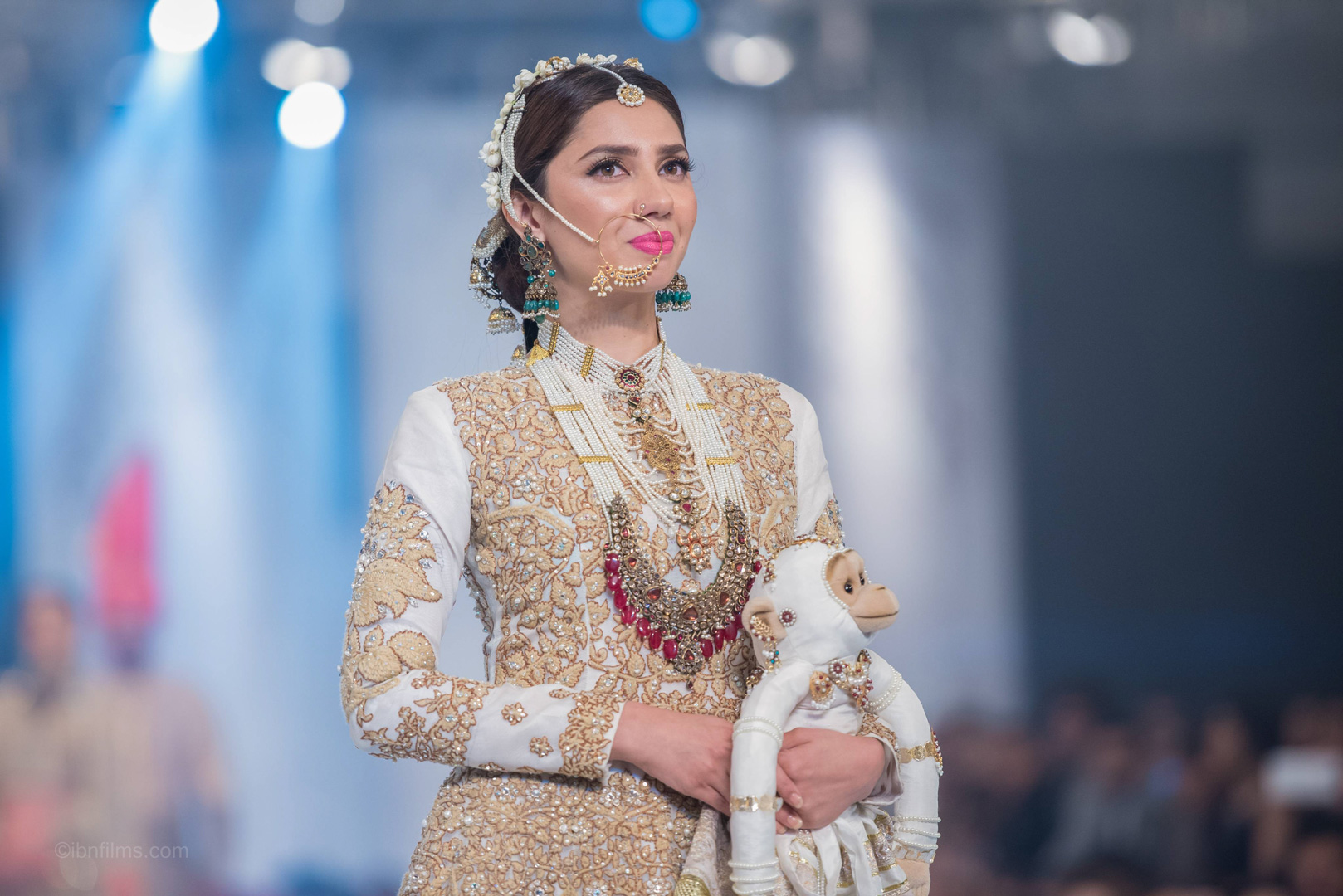Pakistani actress Mahira Khan presenting traditional fashion on the runway at a fashion show in Dubai, photographed by IBN Films.