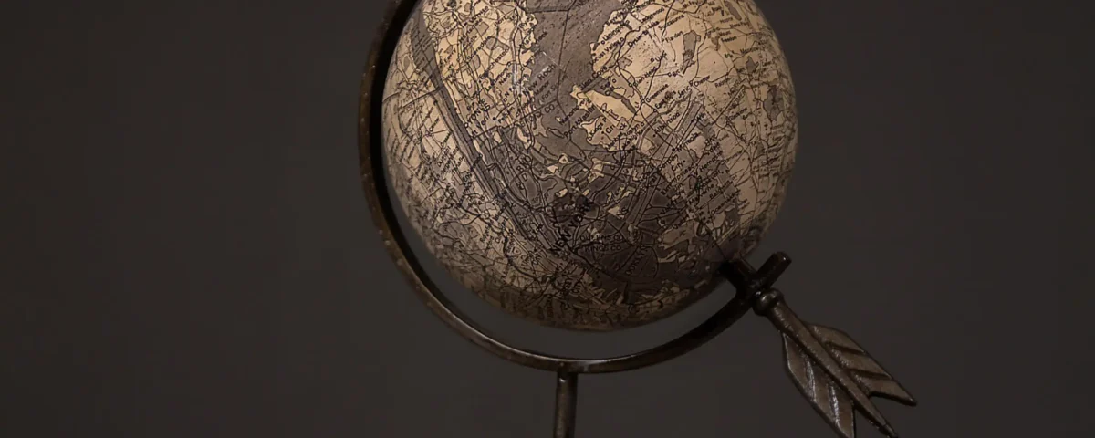 Vintage antique-style desk globe for office decor photographed by IBN FILMS Dubai.