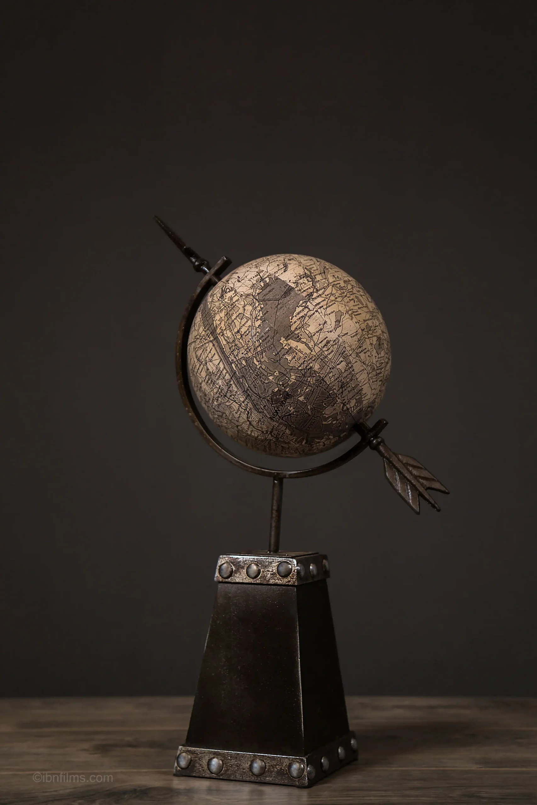 Vintage antique-style desk globe for office decor photographed by IBN FILMS Dubai.