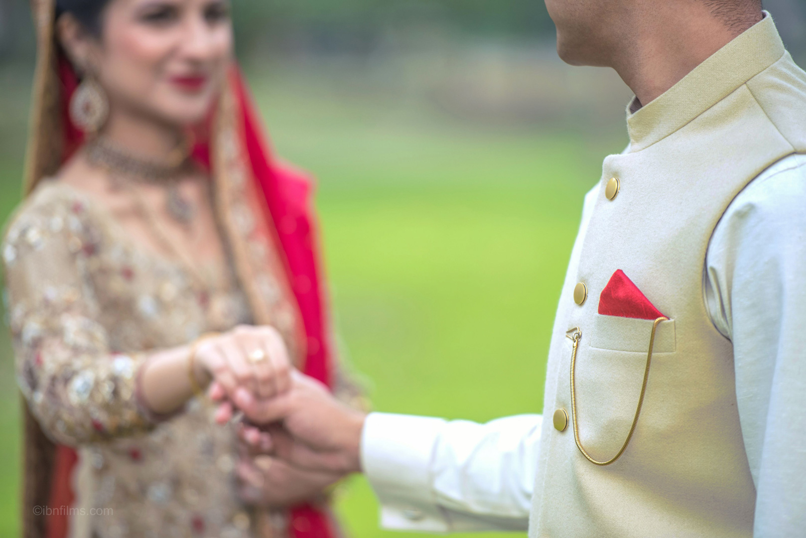 Wedding ring ceremony moment in Dubai capturing the exchange of rings, photographed by IBN Films.